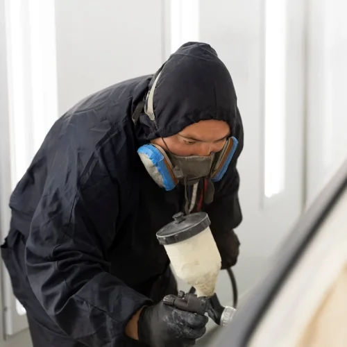 service-worker-painting-car-auto-service_23-2149487037